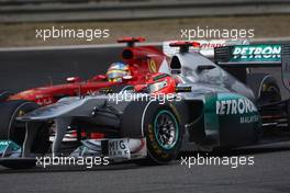 17.04.2011 Shanghai, China,  Fernando Alonso (ESP), Scuderia Ferrari and Michael Schumacher (GER), Mercedes GP  - Formula 1 World Championship, Rd 03, Chinese Grand Prix, Sunday Race