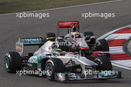 17.04.2011 Shanghai, China,  Nico Rosberg (GER), Mercedes GP and Lewis Hamilton (GBR), McLaren Mercedes  - Formula 1 World Championship, Rd 03, Chinese Grand Prix, Sunday Race