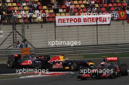 17.04.2011 Shanghai, China,  Sebastian Vettel (GER), Red Bull Racing and Lewis Hamilton (GBR), McLaren Mercedes and Jenson Button (GBR), McLaren Mercedes  - Formula 1 World Championship, Rd 03, Chinese Grand Prix, Sunday Race