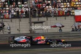 17.04.2011 Shanghai, China,  Sebastian Vettel (GER), Red Bull Racing and Lewis Hamilton (GBR), McLaren Mercedes  - Formula 1 World Championship, Rd 03, Chinese Grand Prix, Sunday Race