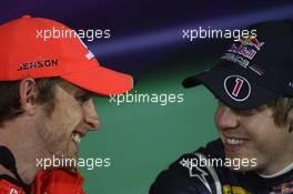 16.04.2011 Shanghai, China,  Jenson Button (GBR), McLaren Mercedes and Sebastian Vettel (GER), Red Bull Racing  - Formula 1 World Championship, Rd 03, Chinese Grand Prix, Saturday Qualifying