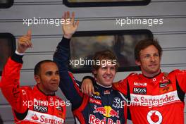 16.04.2011 Shanghai, China,  Lewis Hamilton (GBR), McLaren Mercedes, Sebastian Vettel (GER), Red Bull Racing and Jenson Button (GBR), McLaren Mercedes  - Formula 1 World Championship, Rd 03, Chinese Grand Prix, Saturday Qualifying