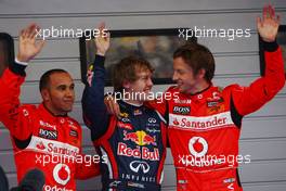 16.04.2011 Shanghai, China,  Lewis Hamilton (GBR), McLaren Mercedes, Sebastian Vettel (GER), Red Bull Racing and Jenson Button (GBR), McLaren Mercedes  - Formula 1 World Championship, Rd 03, Chinese Grand Prix, Saturday Qualifying