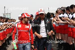 17.04.2011 Shanghai, China,  Felipe Massa (BRA), Scuderia Ferrari and Michael Schumacher (GER), Mercedes GP  - Formula 1 World Championship, Rd 03, Chinese Grand Prix, Sunday