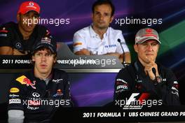 14.04.2011 Shanghai, China,  Michael Schumacher (GER), Mercedes GP and Sebastian Vettel (GER), Red Bull Racing  - Formula 1 World Championship, Rd 03, Chinese Grand Prix, Thursday