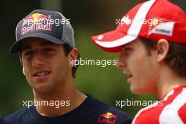 14.04.2011 Shanghai, China,  Daniel Ricciardo (AUS) Test Driver, Scuderia Toro Rosso and Jules Bianchi (FRA), Test Driver, Scuderia Ferrari  - Formula 1 World Championship, Rd 03, Chinese Grand Prix, Thursday