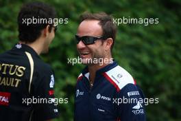 14.04.2011 Shanghai, China,  Bruno Senna (BRE), test driver, Renault F1 Team and Rubens Barrichello (BRA), Williams F1 Team  - Formula 1 World Championship, Rd 03, Chinese Grand Prix, Thursday