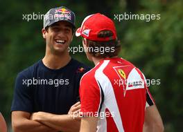 14.04.2011 Shanghai, China,  Daniel Ricciardo (AUS) Test Driver, Scuderia Toro Rosso and Jules Bianchi (FRA), Test Driver, Scuderia Ferrari  - Formula 1 World Championship, Rd 03, Chinese Grand Prix, Thursday