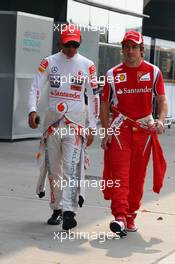 14.04.2011 Shanghai, China,  Lewis Hamilton (GBR), McLaren Mercedes and Fernando Alonso (ESP), Scuderia Ferrari  - Formula 1 World Championship, Rd 03, Chinese Grand Prix, Thursday