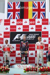 22.05.2011 Barcelona, Spain,  Lewis Hamilton (GBR), McLaren Mercedes with 1st place race winner Sebastian Vettel (GER), Red Bull Racing and 3rd place Jenson Button (GBR), McLaren Mercedes - Formula 1 World Championship, Rd 05, Spainish Grand Prix, Sunday Podium