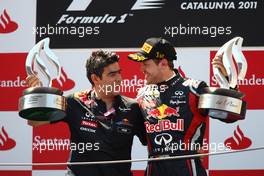 22.05.2011 Barcelona, Spain,  1st place Sebastian Vettel (GER), Red Bull Racing with Peter Prodromou (GBR) Red Bull Racing Head of Aerodynamics - Formula 1 World Championship, Rd 05, Spainish Grand Prix, Sunday Podium