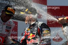 22.05.2011 Barcelona, Spain,  Lewis Hamilton (GBR), McLaren Mercedes, Sebastian Vettel (GER), Red Bull Racing, Jenson Button (GBR), McLaren Mercedes - Formula 1 World Championship, Rd 05, Spainish Grand Prix, Sunday Podium