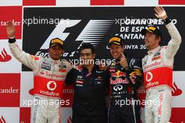 22.05.2011 Barcelona, Spain,  Lewis Hamilton (GBR), McLaren Mercedes with Peter Prodromou (GBR) Red Bull Racing Head of Aerodynamics, 1st place race winner Sebastian Vettel (GER), Red Bull Racing and 3rd place Jenson Button (GBR), McLaren Mercedes - Formula 1 World Championship, Rd 05, Spainish Grand Prix, Sunday Podium