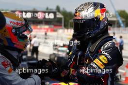 22.05.2011 Barcelona, Spain,  Sebastian Vettel (GER), Red Bull Racing, celebrates victory in parc ferme with Lewis Hamilton (GBR), McLaren Mercedes  - Formula 1 World Championship, Rd 05, Spainish Grand Prix, Sunday Podium