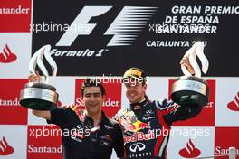 22.05.2011 Barcelona, Spain,  1st place Sebastian Vettel (GER), Red Bull Racing with Peter Prodromou (GBR) Red Bull Racing Head of Aerodynamics  - Formula 1 World Championship, Rd 05, Spainish Grand Prix, Sunday Podium