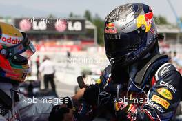 22.05.2011 Barcelona, Spain,  Sebastian Vettel (GER), Red Bull Racing, celebrates victory in parc ferme with Lewis Hamilton (GBR), McLaren Mercedes - Formula 1 World Championship, Rd 05, Spainish Grand Prix, Sunday Podium