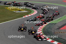 22.05.2011 Barcelona, Spain,  Fernando Alonso (ESP), Scuderia Ferrari, F150 leads at the start - Formula 1 World Championship, Rd 05, Spainish Grand Prix, Sunday Race