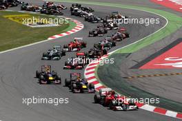 22.05.2011 Barcelona, Spain,  Fernando Alonso (ESP), Scuderia Ferrari, F150 leads at the start - Formula 1 World Championship, Rd 05, Spainish Grand Prix, Sunday Race