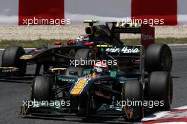 22.05.2011 Barcelona, Spain,  Jarno Trulli (ITA), Team Lotus leads Vitaly Petrov (RUS), Lotus Renault GP - Formula 1 World Championship, Rd 05, Spainish Grand Prix, Sunday Race