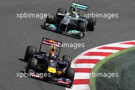 22.05.2011 Barcelona, Spain,  Sebastian Vettel (GER), Red Bull Racing leads Nico Rosberg (GER), Mercedes GP Petronas F1 Team - Formula 1 World Championship, Rd 05, Spainish Grand Prix, Sunday Race