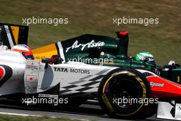 22.05.2011 Barcelona, Spain,  Narain Karthikeyan (IND), Hispania Racing F1 Team, HRT, Heikki Kovalainen (FIN), Team Lotus - Formula 1 World Championship, Rd 05, Spainish Grand Prix, Sunday Race