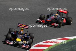 22.05.2011 Barcelona, Spain,  Sebastian Vettel (GER), Red Bull Racing, RB7 leads Lewis Hamilton (GBR), McLaren Mercedes, MP4-26 - Formula 1 World Championship, Rd 05, Spainish Grand Prix, Sunday Race