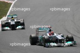 22.05.2011 Barcelona, Spain,  Michael Schumacher (GER), Mercedes GP Petronas F1 Team leads Nico Rosberg (GER), Mercedes GP Petronas F1 Team - Formula 1 World Championship, Rd 05, Spainish Grand Prix, Sunday Race