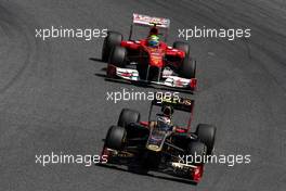 22.05.2011 Barcelona, Spain,  Vitaly Petrov (RUS), Lotus Renault GP, R31 leads Felipe Massa (BRA), Scuderia Ferrari, F150 - Formula 1 World Championship, Rd 05, Spainish Grand Prix, Sunday Race