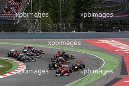 22.05.2011 Barcelona, Spain,  Fernando Alonso (ESP), Scuderia Ferrari, F150 leads at the start - Formula 1 World Championship, Rd 05, Spainish Grand Prix, Sunday Race