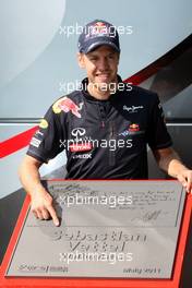 21.05.2011 Barcelona, Spain,  Sebastian Vettel (GER), Red Bull Racing, honoured at the circuit with a plaque - Formula 1 World Championship, Rd 05, Spainish Grand Prix, Saturday