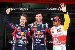 21.05.2011 Barcelona, Spain,  Sebastian Vettel (GER), Red Bull Racing with pole man and Lewis Hamilton (GBR), McLaren Mercedes - Formula 1 World Championship, Rd 05, Spainish Grand Prix, Saturday Qualifying