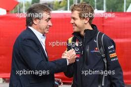 21.05.2011 Barcelona, Spain,  Carlos Sainz (ESP) and Sebastian Vettel (GER), Red Bull Racing  - Formula 1 World Championship, Rd 05, Spainish Grand Prix, Saturday