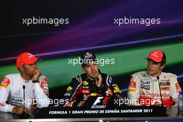 22.05.2011 Barcelona, Spain,  Lewis Hamilton (GBR), McLaren Mercedes with Sebastian Vettel (GER), Red Bull Racing and Jenson Button (GBR), McLaren Mercedes - Formula 1 World Championship, Rd 05, Spainish Grand Prix, Sunday Press Conference