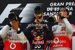 22.05.2011 Barcelona, Spain,  Lewis Hamilton (GBR), McLaren Mercedes with 1st place race winner Sebastian Vettel (GER), Red Bull Racing and 3rd place Jenson Button (GBR), McLaren Mercedes - Formula 1 World Championship, Rd 05, Spainish Grand Prix, Sunday Press Conference