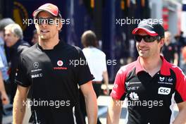 22.05.2011 Barcelona, Spain,  Jenson Button (GBR), McLaren Mercedes and Timo Glock (GER), Marussia Virgin Racing - Formula 1 World Championship, Rd 05, Spainish Grand Prix, Sunday