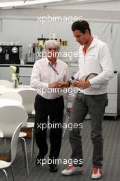 22.05.2011 Barcelona, Spain,  Bernie Ecclestone (GBR) talks with Adrian Sutil (GER), Force India F1 Team - Formula 1 World Championship, Rd 05, Spainish Grand Prix, Sunday