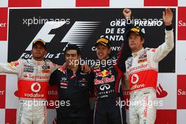 22.05.2011 Barcelona, Spain,  Lewis Hamilton (GBR), McLaren Mercedes with 1st place race winner Sebastian Vettel (GER), Red Bull Racing and 3rd place Jenson Button (GBR), McLaren Mercedes - Formula 1 World Championship, Rd 05, Spainish Grand Prix, Sunday Press Conference