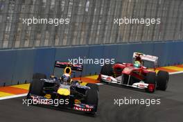 24.06.2011 Valencia, Spain,  Sebastian Vettel (GER), Red Bull Racing leads Fernando Alonso (ESP), Scuderia Ferrari - Formula 1 World Championship, Rd 08, European Grand Prix, Friday Practice