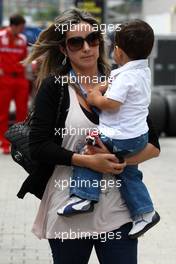 24.06.2011 Valencia, Spain,  Rafaela Bassi (BRA), Wife of Felipe Massa with son Felipinho - Formula 1 World Championship, Rd 08, European Grand Prix, Friday