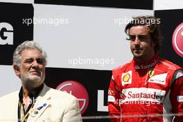26.06.2011 Valencia, Spain,  Placido Domingo and Fernando Alonso (ESP), Scuderia Ferrari - Formula 1 World Championship, Rd 08, European Grand Prix, Sunday Podium