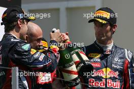 26.06.2011 Valencia, Spain,  Sebastian Vettel (GER), Red Bull Racing and Mark Webber (AUS), Red Bull Racing  - Formula 1 World Championship, Rd 08, European Grand Prix, Sunday Podium