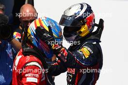 26.06.2011 Valencia, Spain,  Fernando Alonso (ESP), Scuderia Ferrari and Sebastian Vettel (GER), Red Bull Racing - Formula 1 World Championship, Rd 08, European Prix, Sunday Podium