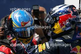 26.06.2011 Valencia, Spain,  Fernando Alonso (ESP), Scuderia Ferrari and Sebastian Vettel (GER), Red Bull Racing  - Formula 1 World Championship, Rd 08, European Grand Prix, Sunday Podium