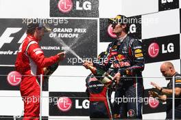26.06.2011 Valencia, Spain,  Fernando Alonso (ESP), Scuderia Ferrari and Mark Webber (AUS), Red Bull Racing - Formula 1 World Championship, Rd 08, European Grand Prix, Sunday Podium