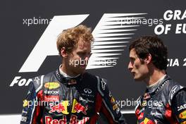 26.06.2011 Valencia, Spain,  Sebastian Vettel (GER), Red Bull Racing wins the race with Mark Webber (AUS), Red Bull Racing  - Formula 1 World Championship, Rd 08, European Grand Prix, Sunday Podium