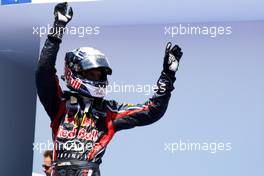 26.06.2011 Valencia, Spain,  Sebastian Vettel (GER), Red Bull Racing, celebrates his win in parc ferme - Formula 1 World Championship, Rd 08, European Grand Prix, Sunday Podium