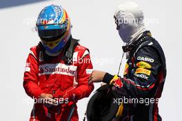 26.06.2011 Valencia, Spain,  Fernando Alonso (ESP), Scuderia Ferrari, Sebastian Vettel (GER), Red Bull Racing - Formula 1 World Championship, Rd 08, European Grand Prix, Sunday Podium
