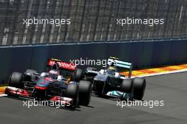 26.06.2011 Valencia, Spain,  Jenson Button (GBR), McLaren Mercedes and Nico Rosberg (GER), Mercedes GP  - Formula 1 World Championship, Rd 08, European Grand Prix, Sunday Race