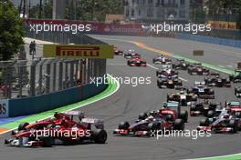 26.06.2011 Valencia, Spain,  Fernando Alonso (ESP), Scuderia Ferrari and Felipe Massa (BRA), Scuderia Ferrari at the start of the race - Formula 1 World Championship, Rd 08, European Grand Prix, Sunday Race