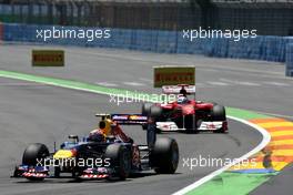 26.06.2011 Valencia, Spain,  Mark Webber (AUS), Red Bull Racing leads Fernando Alonso (ESP), Scuderia Ferrari, F150 - Formula 1 World Championship, Rd 08, European Grand Prix, Sunday Race